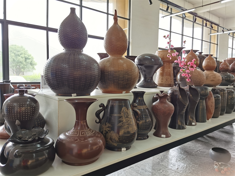 钦州坭兴陶制作过程，坭兴陶的烧制技艺是国家非物质文化遗产